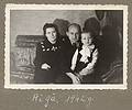 1942 - Riga, Latvia.<br />Mother, father, and Egils.