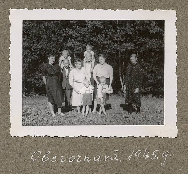 1945 - Oberornau, Bavaria, Germany.<br />?, Baiba, Karlis, Aunt Erna, Arnis, ?, Elga, Hilda, Egils, ?<br />The women at the ends are the local farmers that housed us.