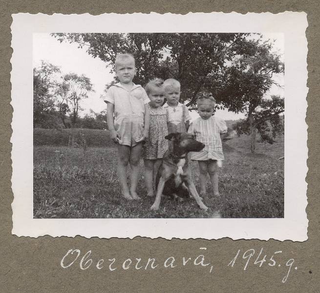 1945 - Oberornau, Bavaria, Germany.<br />Egils, Baiba, Arnis, and Elga.