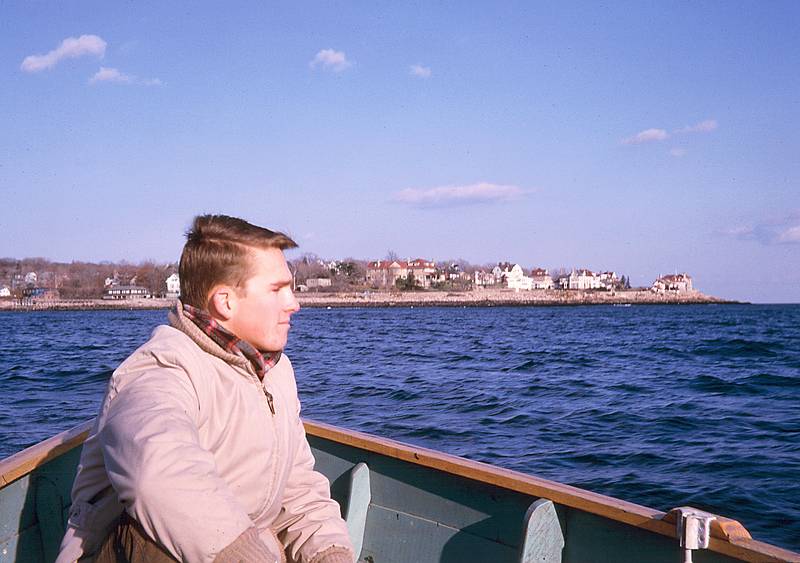 Nov 1962 - Manchester by the Sea.<br />Uldis in boat with Magnolia in background.