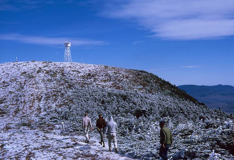 Oct 1963 - Saddleback Mountain, ME.<br />Benny, Peter, Tracy and ? heading for<br />the fire tower at the top of Saddleback Mountain.