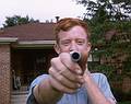 Aug 20, 1965 - At the Schleifs in Denver, Colorado.<br />Phil, Bob's brother, and his dart blow gun.