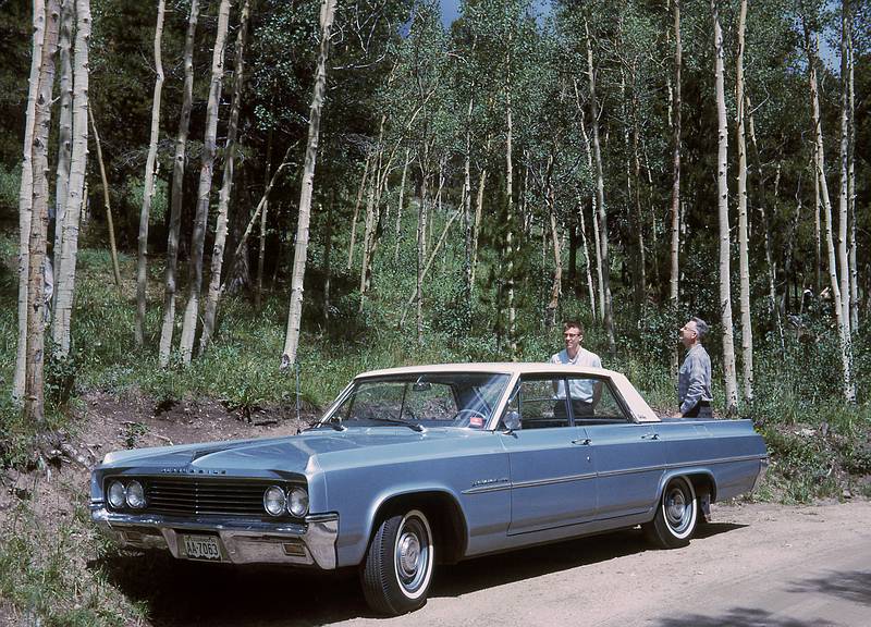 Aug 22, 1965 - Rocky Mountains, Colorado.<br />Bob and his father checking the sky for an approaching thunderstorm.