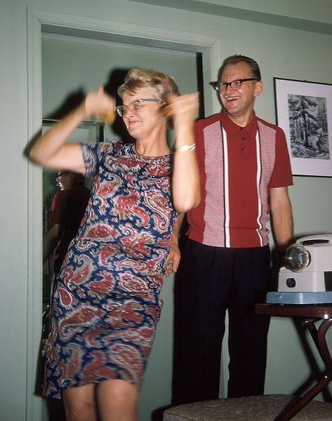 Sept 1966 - At the Grauss in Philadelphia, PA.<br />Regina demonstrating a Spanish dance while Heino shows us slides of their trip to Spain.