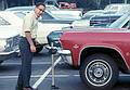June 24, 1968 - R&S car parts store parking lot, Middletown, New Jersey.<br />Jack trying his new jack that he bought at R&S.