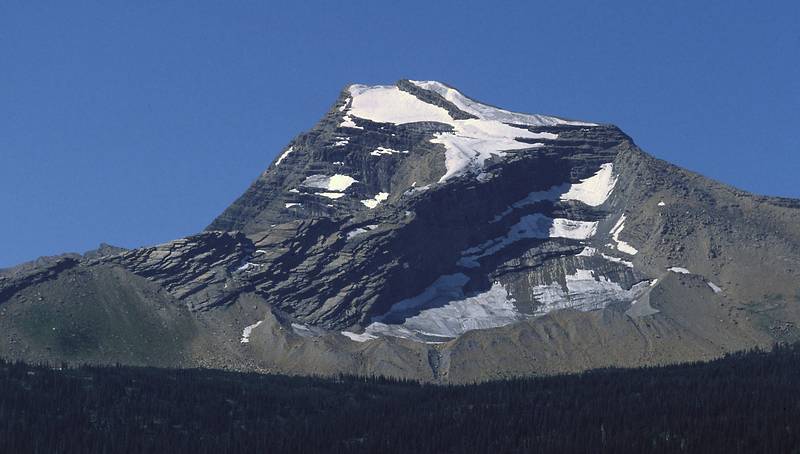 August 17, 1979 - Glacier National Park, Montana.<br />Telephoto (135 mm) from Going-to-the-Sun highway.<br />Longfellow Peak or Ipasha Peak?