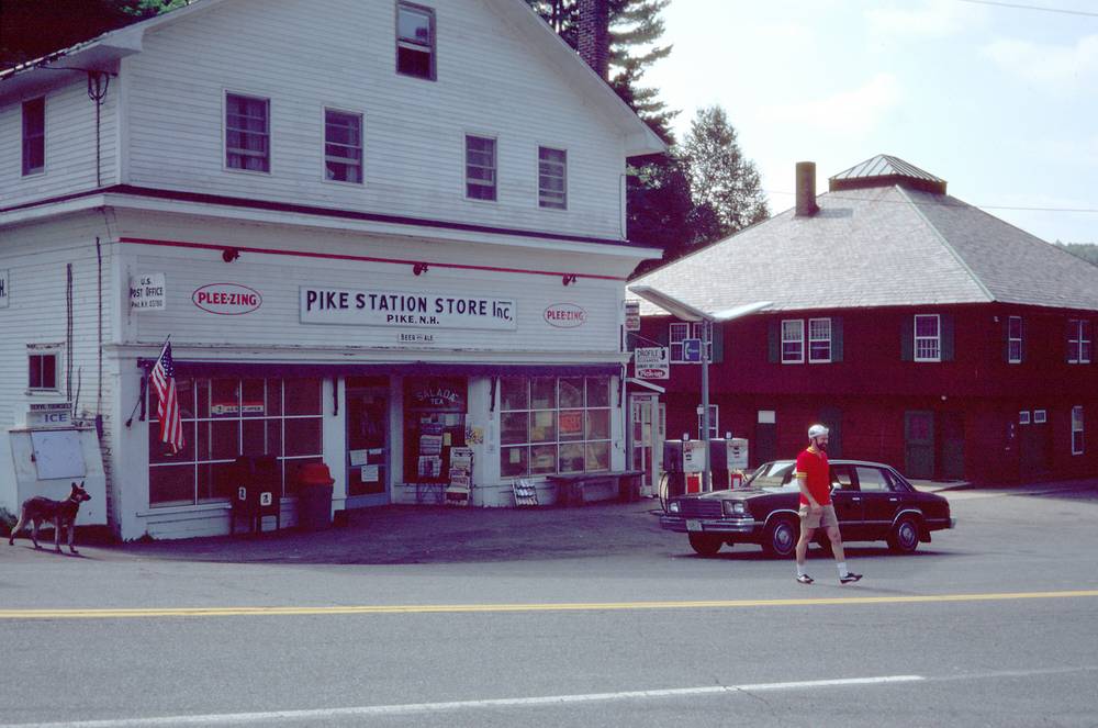 Sept. 7, 1981 - Vermont Bicycle Touring trip with based at Lyme Loch Inn, New Hampshire.<br />The Pike Station Store at Pike, New Hampshire.<br />Buzzy crossing the road.