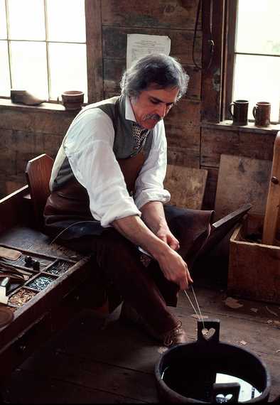 May 1, 1982 - Sturbridge Village, Massachusetts.<br />The village cobbler.