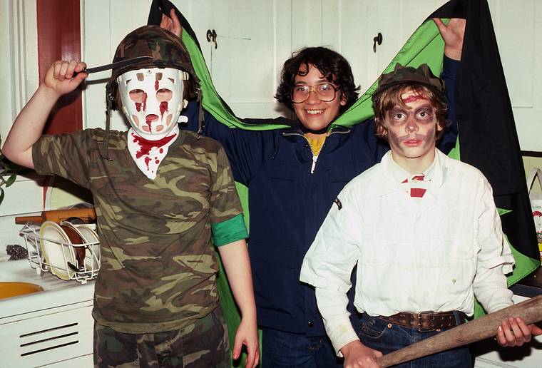 Oct. 31, 1983 - Merrimac, Massachusetts.<br />Steven, Carl, and Nathan in Halloween costumes in the kitchen.