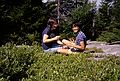 July 14, 1984 - Atop Pack Monadnock, New Hampshire.<br />Joyce and Eric picking and eating blueberries.