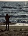 May 7, 1984 - Point Reyes National Seashore, California.<br />Joyce looking at a whale at McClures Beach.