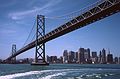 May 9, 1984 - San Francisco, California.<br />Sightseeing boat ride from Pier 39 to Golden Gate Bridge and back.<br />San Francisco skyscrapers under the Oakland Bay Bridge.