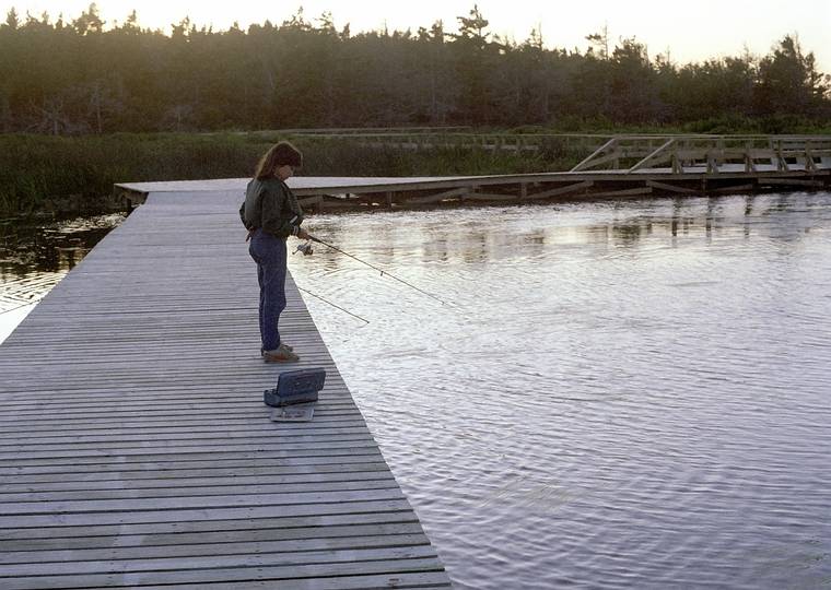 August 25, 1984 - Prince Edward Island National Park, Canada.<br />Melody fishing.