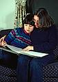 January 1985 - Merrimac, Massachusetts.<br />Melody and Joyce reading a picture book.