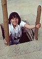 July 26, 1986 - Mesa Verde National Park, Colorado.<br />Spruce Tree House Anasazi village.<br />Melody emerging from a Kiva.
