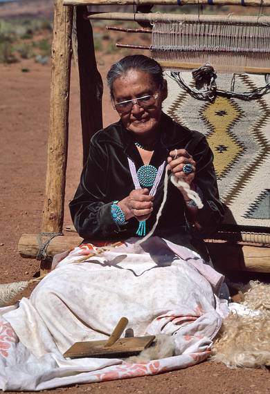 July 28, 1986 - Monument Valley, Arizona/Utah.<br />Tour photo op: Navajo weaver.