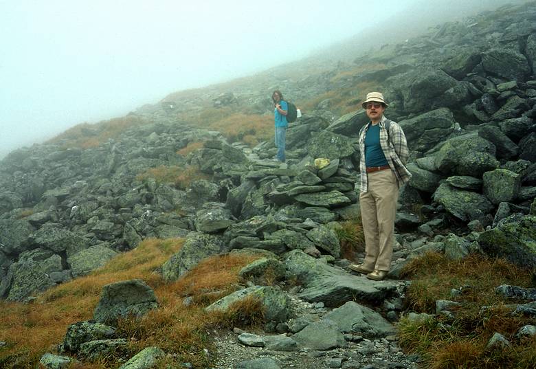 Sept. 7, 1987 - Mt. Washington area, New Hampshire.<br />Hike from Lakes of the Clouds AMC hut to Pinkham Notch via Mt. Washington.<br />Joyce and Juris on trail up Mt. Washington (in the fog).