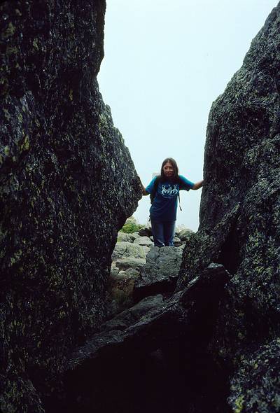 Sept. 7, 1987 - Mt. Washington area, New Hampshire.<br />Hike from Lakes of the Clouds AMC hut to Pinkham Notch via Mt. Washington.<br />Joyce at Glen Boulder.