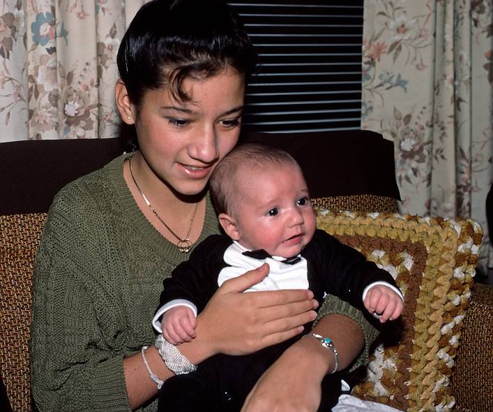 Nov. 26, 1987 - At Marie's for Thanksgiving, Lawrence, Massachusetts.<br />Melody holding TJ.