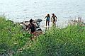 August 16-30, 1987 - Camping on Burton Island on Lake Champlain, Vermont.<br />Melody, Becky, and Eric coming back from swimming off our camp site.