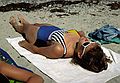 July 2-15, 1988 - Bailey Island, Maine.<br />Becky catching some rays.