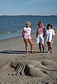July 15, 1988 - Somewhere along the Maine coast on our way back from Bailey Island.<br />Sand sculpture and its artists.