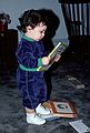 Feb, 1989 - At Paul and Norma's, Teksbury, Massachusetts.<br />TJ looking at Joyce's "Giants of Smaller Worlds".