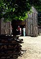 July 2, 1989 - Sturbridge Village, Massachusetts.<br />Joyce, with white blouse and skirt, is among the spectators in the door.