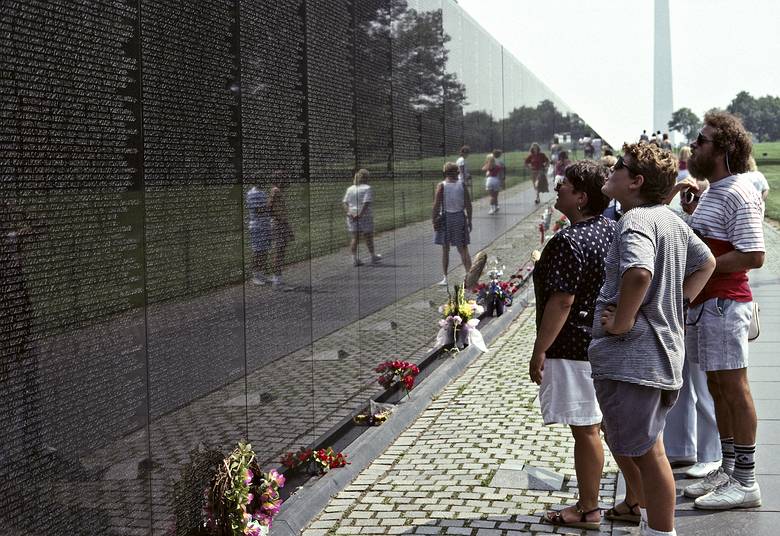 August 27, 1990 - Washington, District of Columbia.<br />Norma, Jeremy, Marie, and Paul reading names on the Vietnam Veterans Memorial<br />which was designed by Maya Ying Lin.