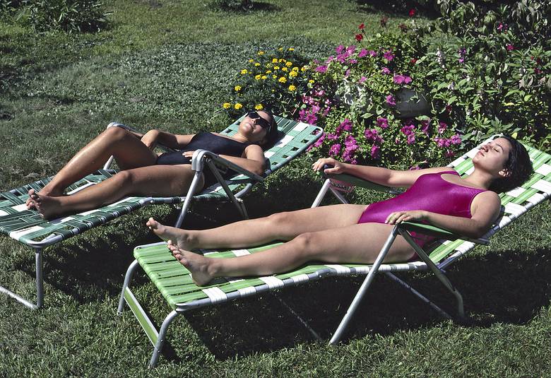Sept. 3, 1990 - Lawrence, Massachusetts.<br />Natalia and Melody catching some rays.