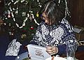 Dec. 25, 1990 - Merrimac, Massachusetts.<br />Joyce is opening one of her Christmas presents.