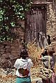 June 30, 1990 - Toledo, Spain.<br />Melody and Baiba taking pictures of grapes on an old wall.