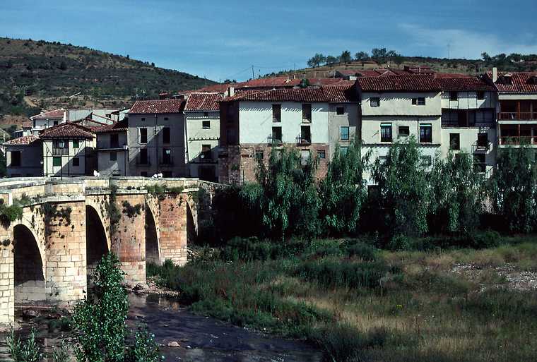 July 2, 1990 - Covarrubias, Burgos, Spain.<br />Bridge over the Rio Arlanza and part of the town.