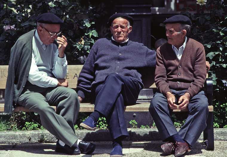 July 2, 1990 - Burgos, Spain.<br />Three locals on Paseo del Espoln.