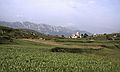 July 3, 1990 - Cue, Asturias, Spain.<br />Local church with the Picos the Europa in the background.