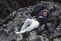 July 3, 1990 - Cue, Asturias, Spain.<br />Joyce taking a siesta on the rocks.