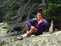 August 15, 1991 - Haystack Mountain School of Crafts, Deer Isle, Maine.<br />Julian next to another stone sculture.