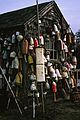 October 1991 - York, Maine.<br />Shack with lobster trap markers.