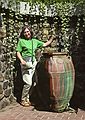 August 12, 1992 - Longwood Gardens, Kennett Square, Pennsylvania.<br />Joyce petting a snake spouting water into a ceramic urn.