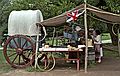 August 20, 1992 - Colonial Williamsburg, Virginia.<br />Joyce buying something from a local vendor.