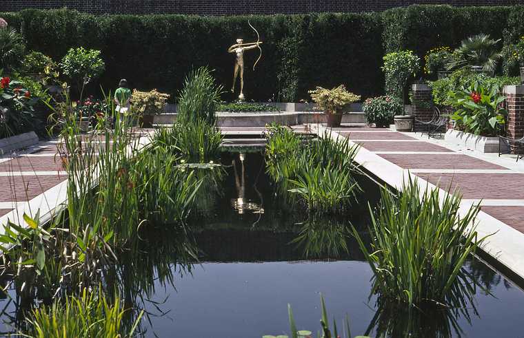 August 21, 1992 - Colonial Williamsburg, Virginia.<br />Joyce in the garden of the Public Hospital.