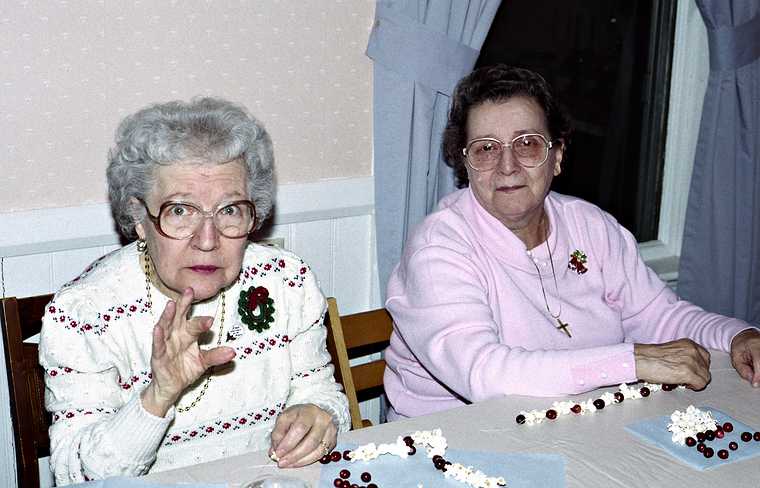 Dec. 20, 1992 - Merrimac, Massachusetts.<br />Christmas tree decoration.<br />Marie and her friend Annette.