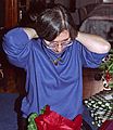 Dec. 24, 1992 - Christmas Eve, Merrimac, Massachusetts.<br />Joyce trying on a necklace.