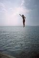 July 10, 1993 - Cliff Island, Casco Bay, Maine.<br />A ferry boat crew member diving into the bay.