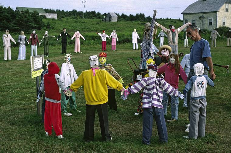 August 1, 1993 - Cheticamp, Cape Breton Island, Nova Scotia, Canada.<br />Ronnie dancing along with some lifesized figures.