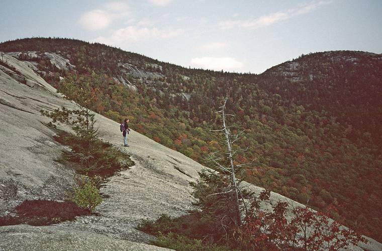 Oct. 3, 1993 - Dickey - Welch hike, Thornton, New Hampshire.<br />Joyce on one of the open ledges on the way up to Dickey.