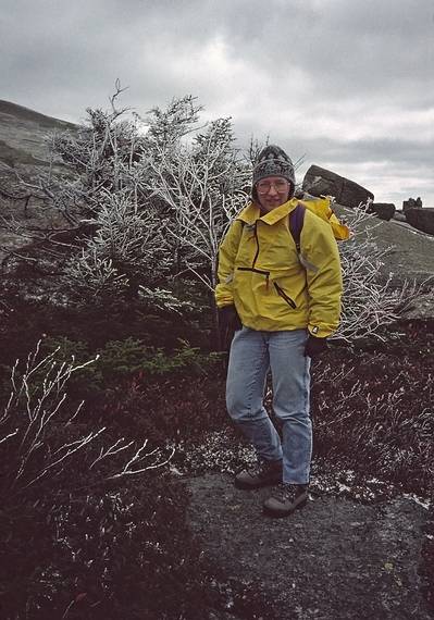 Oct. 10, 1993 - Mount Cardigan, Orange/Alexandria, New Hampshire.<br />Joyce (with a smile, in spite of the weather) on Mowglis Trail.