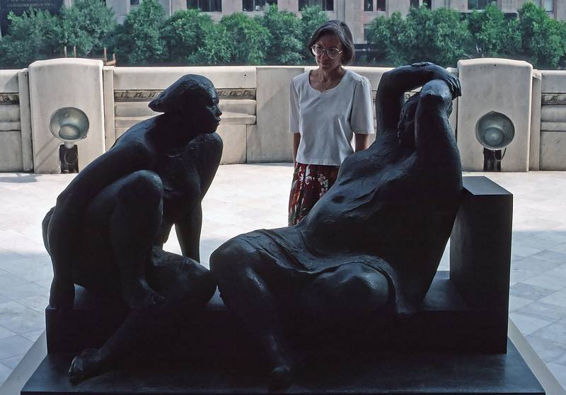 June 9, 1994 - Mexico City, Mexico.<br />Joyce on a balcony at the Bellas Artes building with a statue of two people.