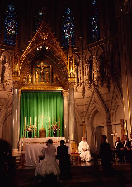 Sept. 3, 1994 - Lowell, Massachusetts.<br />Lisa's and Tim's wedding.<br />Lisa and Tim kneeling at the altar.
