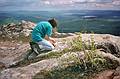 May 27, 1995 - South Moat Mountain, Albany, New Hampshire.<br />Joyce placing a pattern of sand dollars on the rock.